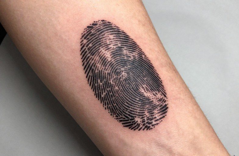 Fingerprint Tattoo Meaning: Identity, Loss, and Permanent Bonds