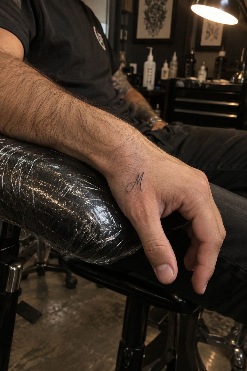 Fine-Line Initial Behind the Thumb
