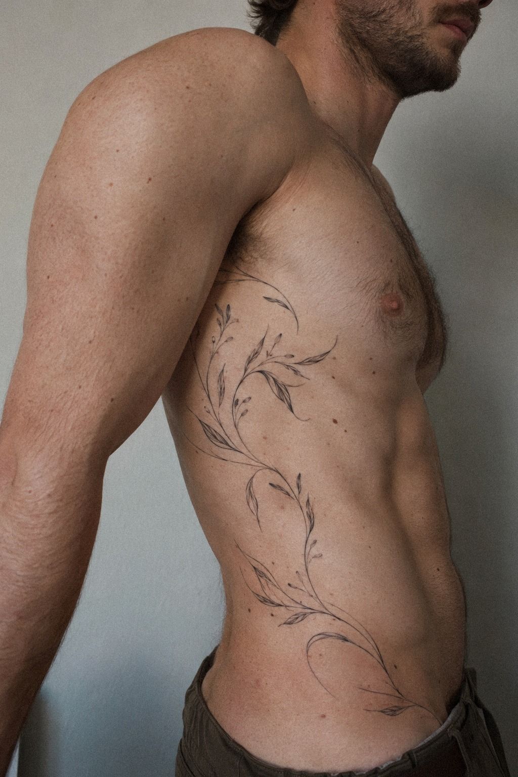 Plan A Graceful Rib Tattoo With Movement