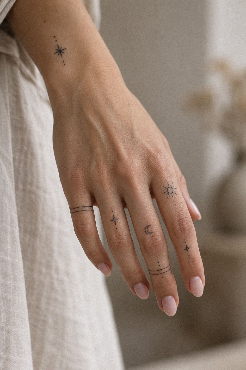 Delicate Ring Finger Linework Tattoos